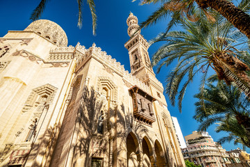 .18/11/2018 Alexandria, Egypt, Incredibly beautiful mosque Abo El Abass against blue sky and palm...