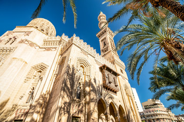 .18/11/2018 Alexandria, Egypt, Incredibly beautiful mosque Abo El Abass against blue sky and palm...