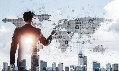 Concept of business success and control with confident boss against cityscape background