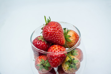 Red strawberry fruit for fresh food or a food ingredient can see at many markets or supermarket in Thailand 