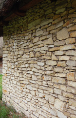 Old brick wall of stone