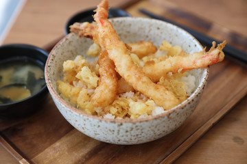 Tempura donburi , Fried shrimp tempura on rice japanese food on wooden table
