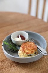 Scones with cream and strawberry jam