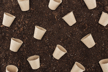 top view of used paper cups on ground,  protecting nature concept