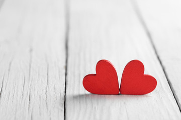 Valentine background with handmade heart on rustic wood. Saint Valentines day greeting card.