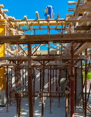 concrete work: workers carpenters preparing construction formwork for concreting at building area