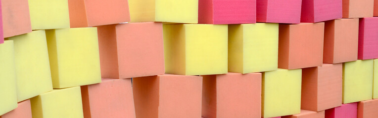 Wall of paralon soft cubes in dry pool, trampoline in the childrens center