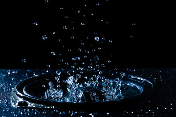 Obraz na płótnie Canvas Water droplets on the loudspeaker.