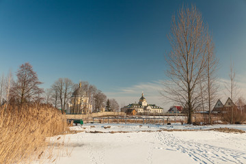 Fototapeta na wymiar Old church Life-giving shot of buildings in the midst of the winter beauty of Svityaz Ukraine