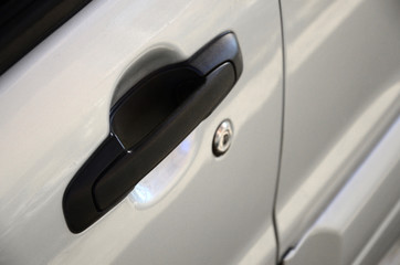 Close up black car door handle. Car equipment
