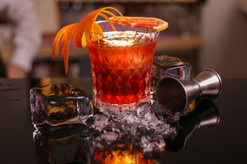 alocohol cocktail negroni on black surface