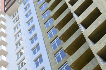 Residential multi store apartement building house facade under construction