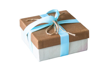 Gift box Tied with a pink ribbon close up on a white background.