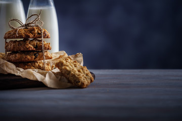 Healthy breakfast. Oatmeal cookies with nuts and raisins and milk