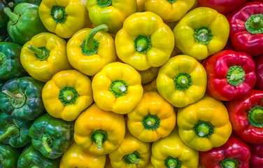 Pile of fresh sweet peppers on a market place 