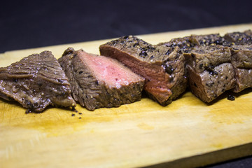 Medium Roast Steak on wooden plate 
