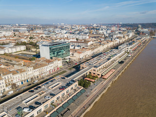 Fototapeta na wymiar Aerial view Quai de Bordeaux, Hangar 14, Congress, Bordeaux and the Garonne river