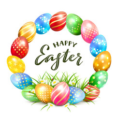 Colorful Easter Eggs in Grass on White Background