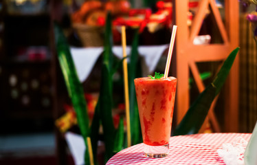 Fruit alcohol cocktail in a coutry home cafe