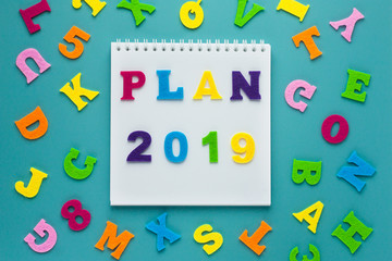 Inscription plan 2019 on blue background. Future planning. lifestyle design. business strategy concept. Motivation concept. Financial growth. Healthy lifestyle. Concept business idea, strategy.