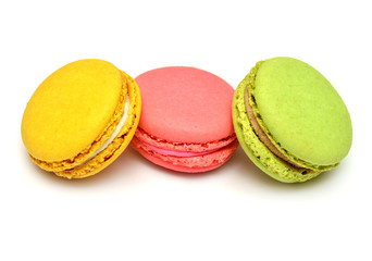 Beautiful macaroons multicolored isolated on white background. French confection
