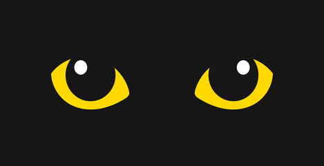 Yellow cat eyes in the dark.