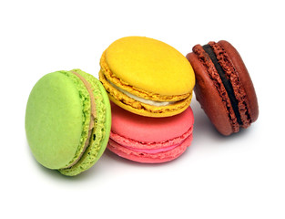 Beautiful macaroons multicolored isolated on white background. French confection
