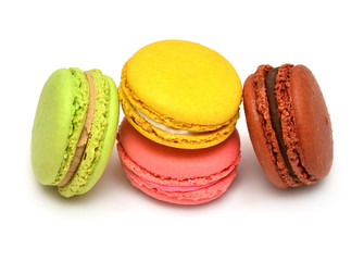 Beautiful macaroons multicolored isolated on white background. French confection