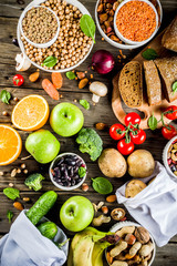 Healthy food. Selection of good carbohydrate sources, high fiber rich food. Low glycemic index diet. Fresh vegetables, fruits, cereals, legumes, nuts, greens.  copy space