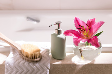 Relax at Home Luxury Bathroom Interior White Empty Bathtub Pink Lily Flower Glass Vase White Towel Soap Dispenser Massage Brush Nobody Cleanliness Elegance Room Decor Bright Healthy Treatment Hygiene