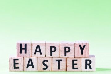 Happy easter text on wooden blocks