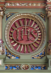 IHS sign on the altar in the Basilica of the Sacred Heart of Jesus in Zagreb, Croatia 