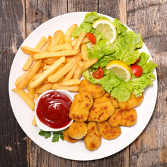 nugget with french fries and salad