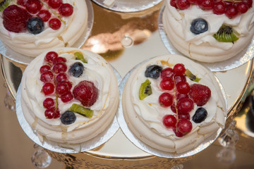 Cupcake  with  whipped cream and fruits