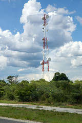 Fototapeta premium Cell phone signal relay towers alongside road in Botswana.