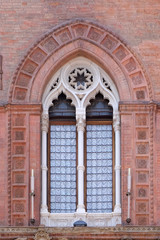 Fototapeta na wymiar Window, Palazzo Comunale Palace Building - City Hall in Bologna, Italy