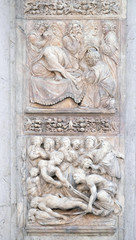 Isaac blesses Jacob by Ercole Seccadenari up and Burial of Jacob's wife by Amico Aspertini, left door of San Petronio Basilica in Bologna, Italy