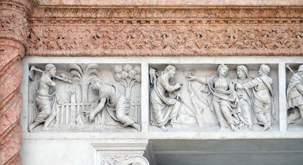 Christ in the Garden of Mary Magdalene left and Mary Magdalene points out Redeemer right by Zaccaria da Volterra, door of San Petronio Basilica in Bologna, Italy