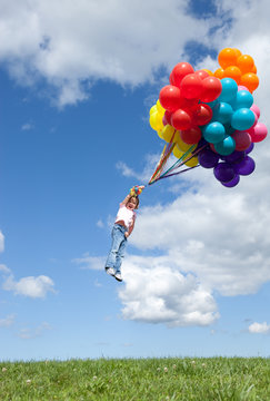 Little Girl Flying Away with Bunch of Balloons