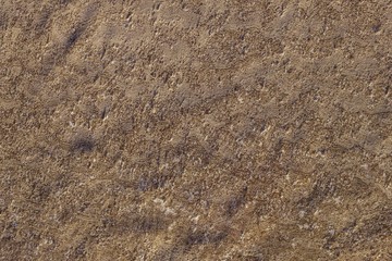 Brown soil, earth.