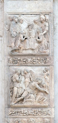 Jacob and the Angel by Niccolo Tribolo up and Benjamin brings the cup to Pharaoh by Francesco da Milano, left door of San Petronio Basilica in Bologna, Italy