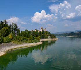 Fototapeta premium Scenic view of Niedzica Castle and artificial Czorsztynskie Lake in Southern Poland