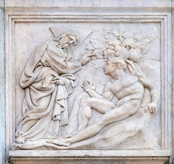 Creation of Adam, Genesis relief on portal of Saint Petronius Basilica in Bologna, Italy