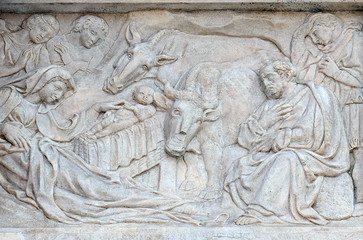 Nativity Scene, Adoration of the Shepherds, relief on portal of Saint Petronius Basilica in Bologna, Italy