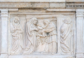 The Presentation in the Temple central door of San Petronio Basilica in Bologna, Italy