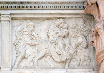 Flight to Egypt, relief on portal of Saint Petronius Basilica in Bologna, Italy