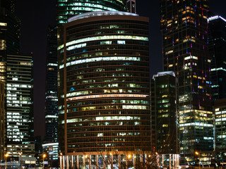 Fototapeta na wymiar front view of buildings in Moscow City at night