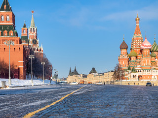 Obraz premium Kremlin Towers and St Basil Cathedral in Moscow