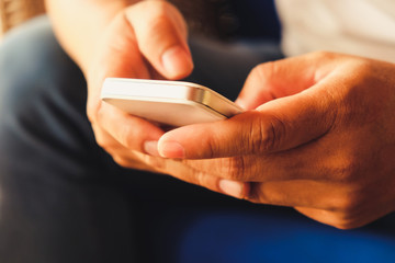 close up image of Phone on hands.