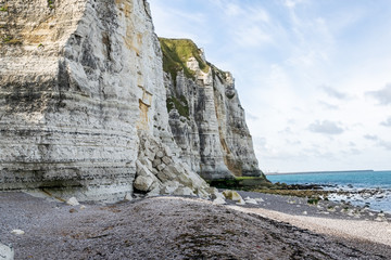 Cliff in Etretat in Summer with Ocean in the Background